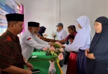Kemenag Baznas Halteng Salurkan Infak untuk Disabilitas dan Yatim