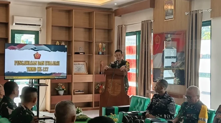 Tim WASEV TMMD Kunjungi Desa Oyom Lampasio