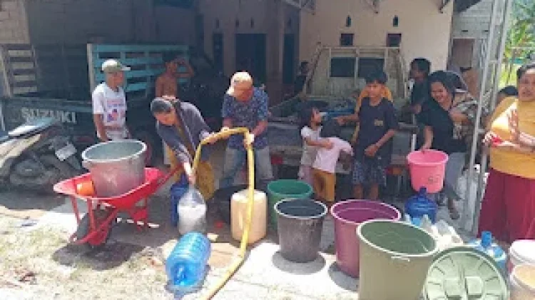 Kodim 1305/BT Salurkan Air Bersih untuk Warga Desa Buntuna