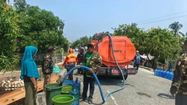 Kemarau Panjang, GP Ansor Buol Salurkan Bantuan Air Bersih