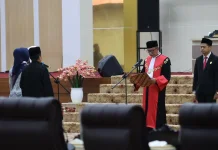 Kakanwil Kemenkum Sulteng Hadiri Pengambilan Sumpah Wakil Ketua DPRD Sulteng
