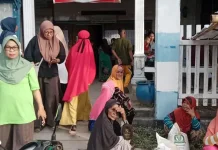 Bulog Salurkan Bantuan Pangan di Kelurahan Nalu, 900 Warga Terima Beras dan Minyak