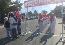 Sekda Aru Lepas Peserta Gerak Jalan Indah Tingkat SMP dan SMA/SMK