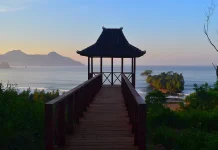 Pelang Beach: Coastal Views, Waterfall and Hilltop Vantage