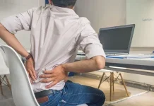 Mengapa Duduk Lama Pinggang Terasa Sakit?