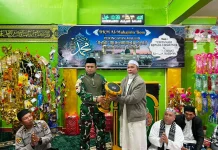 Satgas Yonif 511/DY dan Umat Muslim Tiom Peringati Maulid Nabi 1448 H
