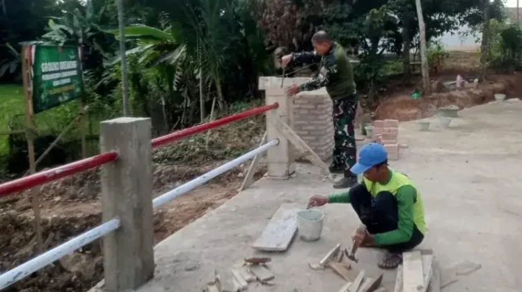 Kodim 0411/KM Geber Pembangunan Jembatan Perintis