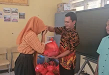 UPT SMPN 7 Banjit Salurkan Zakat Fitrah