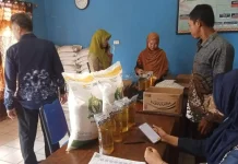 Warga Kecamatan Way Tuba dan Bumi Agung Terima Bantuan Pangan