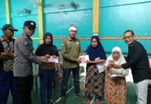 Polsek Kasui Kawal Penyaluran BLT Dana Desa di Kampung Jaya Tinggi