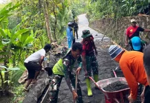 Satgas TMMD dan Warga Fokus pada Penyelesaian Rabat Beton Jalan