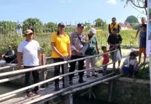 Sambut Hari Bhayangkara, Polsek Banguntapan Mancing Bersama Warga di Kali Belik